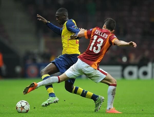 Arsenal's Aaron Ramsey Outwits Galatasaray's Alex Telles in UEFA Champions League Clash