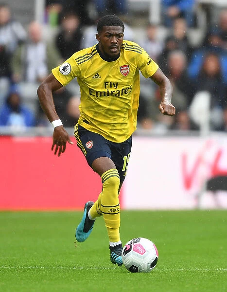 Arsenal's Ainsley Maitland-Niles in Action against Newcastle United - Premier League 2019-20