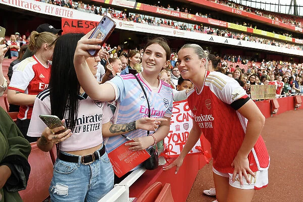 Arsenal's Alessia Russo and Fan Share a Selfie after Arsenal Women vs Liverpool Women Match at Emirates Stadium (2023-24)