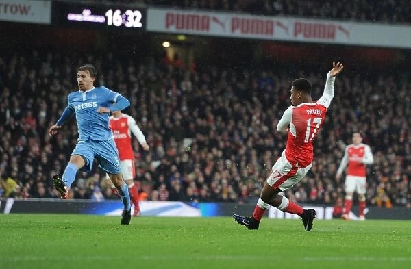 Arsenal's Alex Iwobi Scores Third Goal Against Stoke City in Premier League Match, December 2016