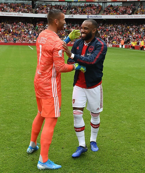 Arsenal's Alex Lacazette Greets Opponent Goalkeeper Before Emirates Cup Match
