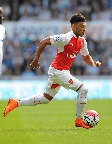 Arsenal's Alex Oxlade-Chamberlain Faces Off Against Newcastle United in Premier League Clash (2015-16)