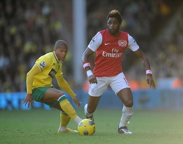 Arsenal's Alex Song vs. Norwich's Simeon Jackson: Barclays Premier League Clash at Carrow Road (November 19, 2011)