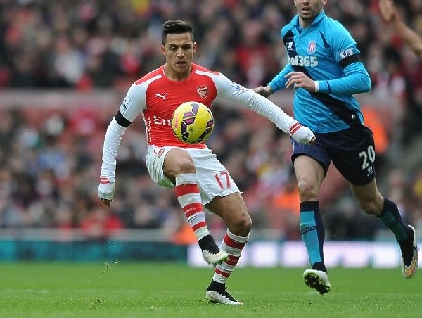 Arsenal's Alexis Sanchez in Action against Stoke City - Premier League 2014-15
