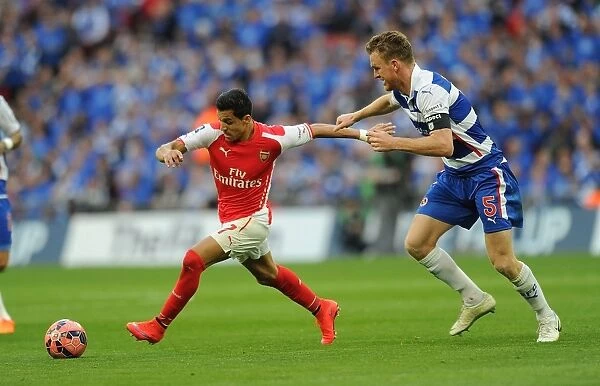 Arsenal's Alexis Sanchez Battles Reading's Alex Pearce in FA Cup Semi-Final Clash