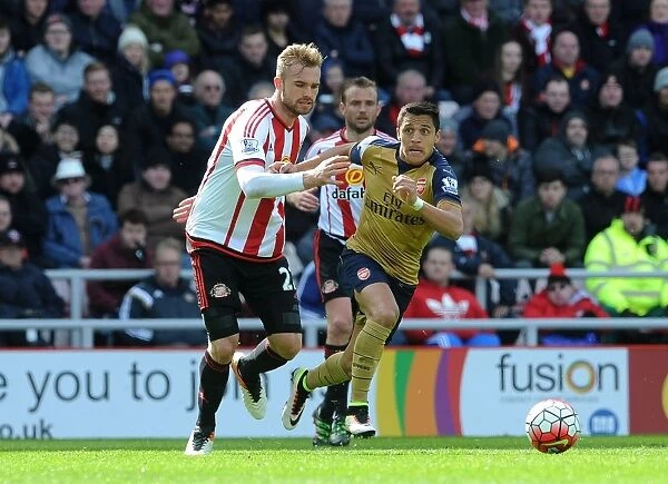 Arsenal's Alexis Sanchez Faces Off Against Sunderland's Jan Kirchhoff in Premier League Clash