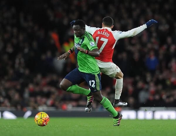 Arsenal's Alexis Sanchez Fouls by Southampton's Victor Wanyama in Intense Premier League Clash (2015-16)