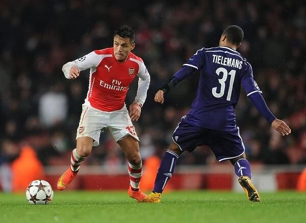 Arsenal's Alexis Sanchez Outmaneuvers Anderlecht's Youri Tielemans in Champions League Clash