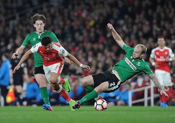 Arsenal's Alexis Sanchez Outmaneuvers Lincoln's Defenders in FA Cup Quarter-Final Showdown