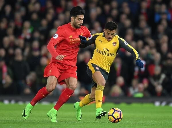 Arsenal's Alexis Sanchez Outmaneuvers Liverpool's Emre Can in Intense Premier League Clash (2016-17)