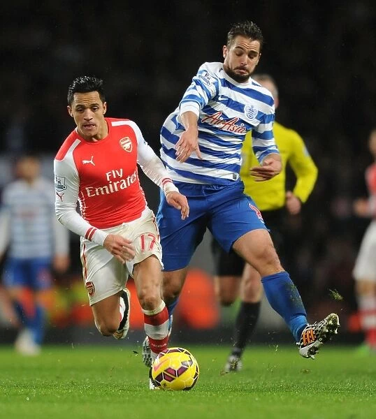 Arsenal's Alexis Sanchez Outmaneuvers QPR's Nico Kranjcar during the 2014-15 Premier League Match