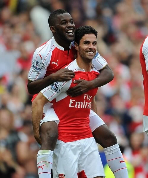 Arsenal's Arteta and Campbell Celebrate Goals Against Aston Villa (2015-16)