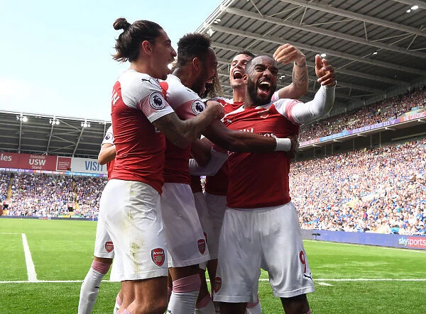 Arsenal's Aubameyang, Bellerin, and Lacazette Celebrate Goals Against Cardiff City
