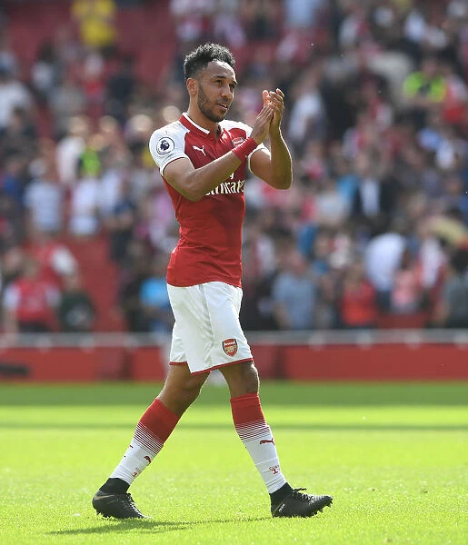 Arsenal's Aubameyang Celebrates with Fans after Victory over West Ham