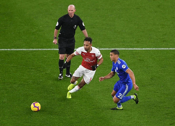 Arsenal's Aubameyang Faces Off Against Cardiff's Peltier in Premier League Clash