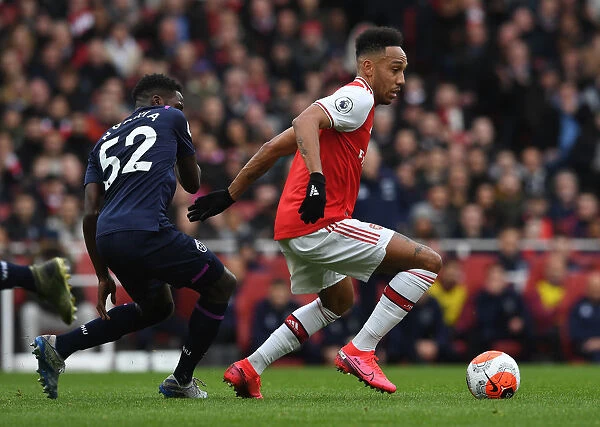 Arsenal's Aubameyang Faces Off Against West Ham's Ngakia in Premier League Clash