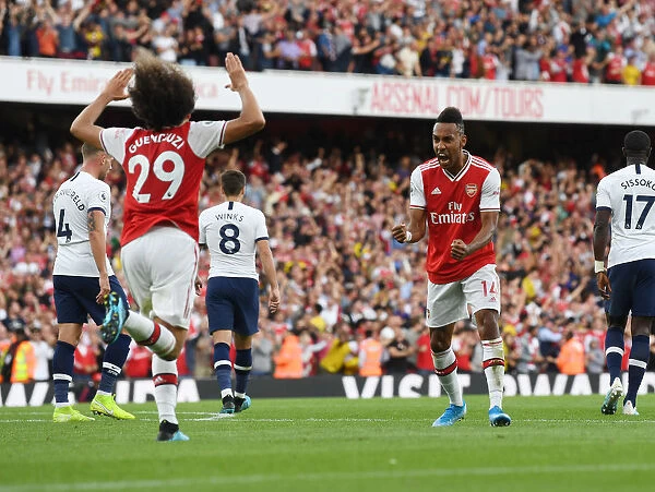 Arsenal's Aubameyang and Guendouzi Celebrate Goals Against Tottenham in 2019-20 Premier League Clash