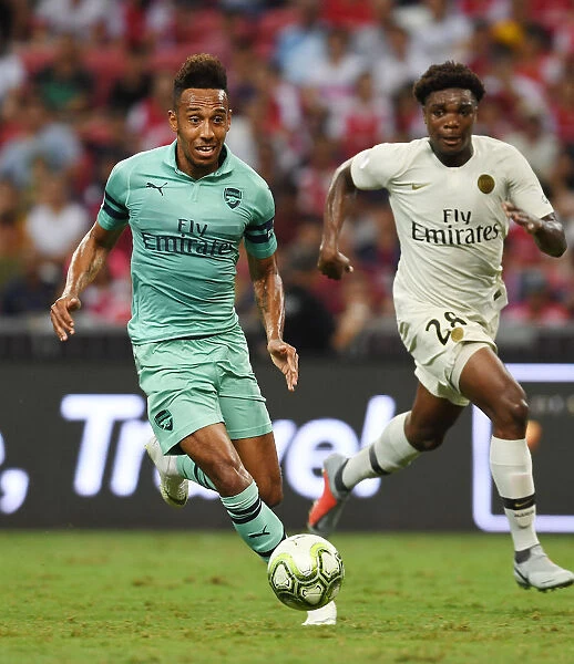 Arsenal's Aubameyang Outmaneuvers Mbe Soh: A Memorable Moment from the Arsenal vs. PSG International Champions Cup Clash, Singapore 2018