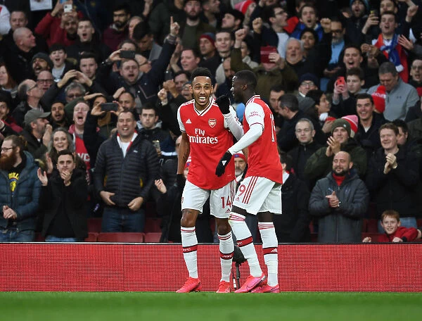 Arsenal's Aubameyang and Pepe Celebrate Goals Against Everton in Premier League Showdown (2020)