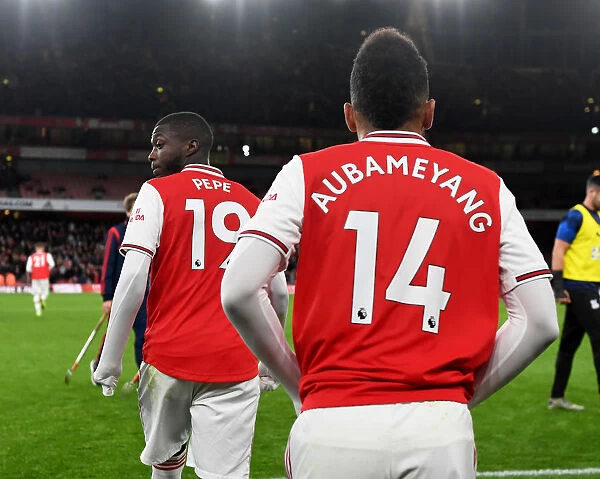 Arsenal's Aubameyang and Pepe in Deep Thought at Half-Time during Arsenal vs Crystal Palace, Premier League 2019-20