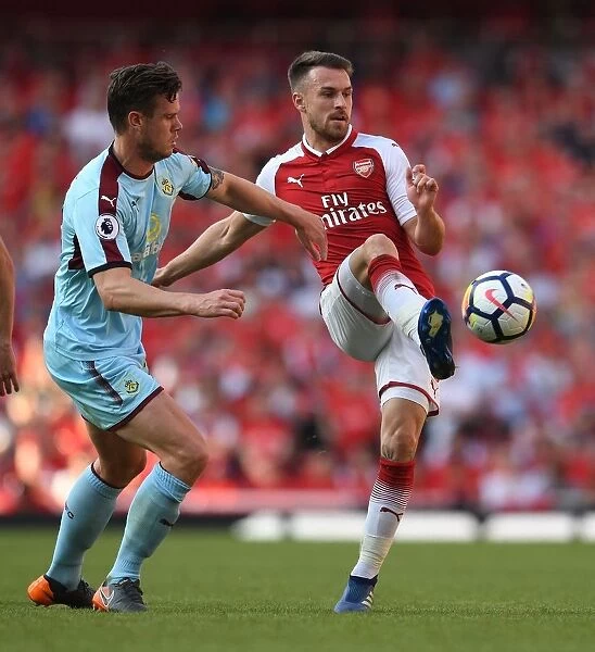 Arsenal's Battle at Emirates: Ramsey vs Long - A Clash of Football Fortunes