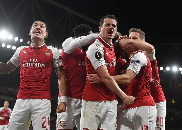 Arsenal's Bellerin and Xhaka Celebrate Goal Against Atletico Madrid in Europa League Semi-Final