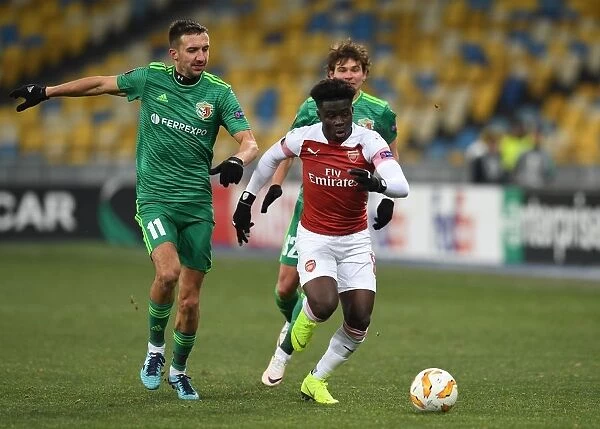 Arsenal's Bukayo Saka Faces Off Against Vyacheslav Sharpar in Europa League Clash