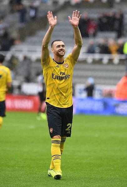 Arsenal's Calum Chambers Celebrates with Fans after Newcastle United Win