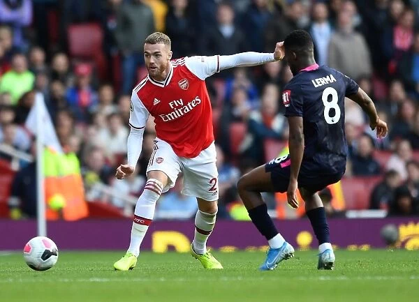 Arsenal's Chambers Faces Pressure from Bournemouth's Lerma in Premier League Clash