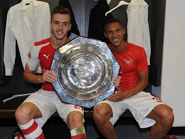 Arsenal's Chambers and Gibbs Celebrate FA Community Shield Victory