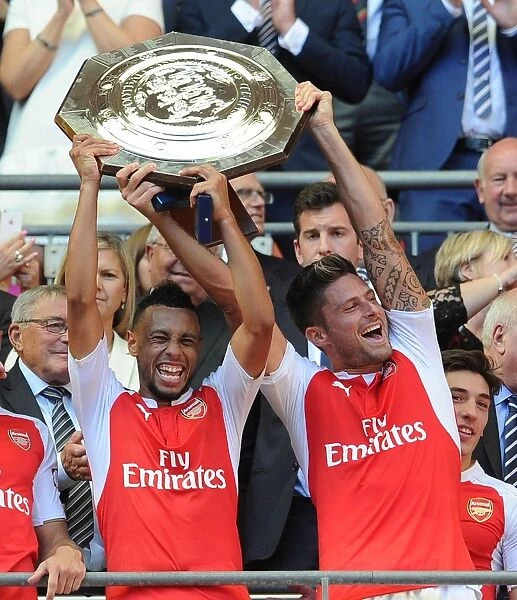 Arsenal's Coquelin and Giroud Lift the Community Shield Trophy