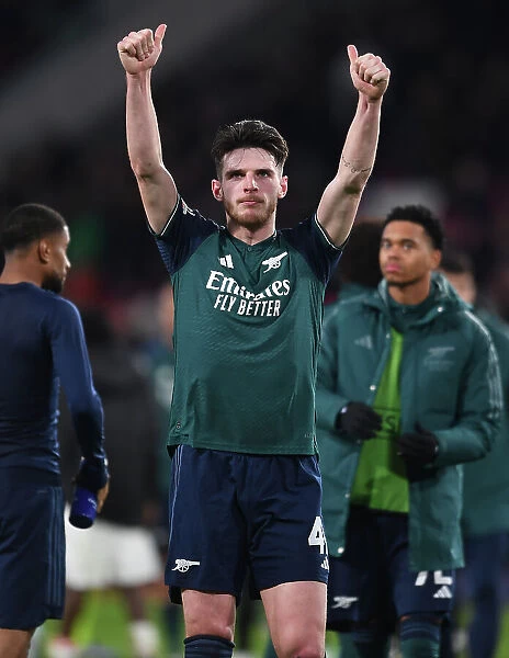 Arsenal's Declan Rice Celebrates with Fans after Winning in PSV Eindhoven's Philips Stadion - UEFA Champions League 2023 / 24