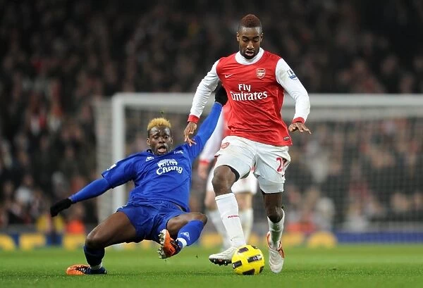 Arsenal's Djourou Stops Saha: Arsenal Edge Everton 2:1 in Premier League Clash at Emirates Stadium, 2011