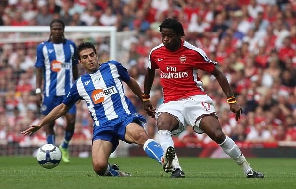 Arsenal's Double Victory: 4-0 Over Wigan Athletic Featuring Alex Song vs. Jordi Gamez, Emirates Stadium, September 19, 2009