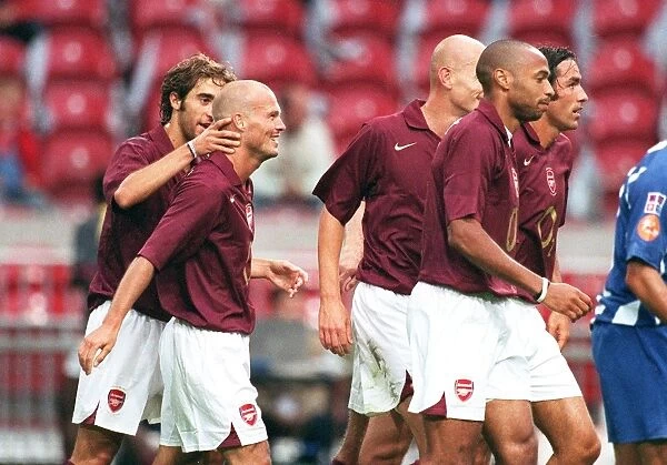 Arsenal's Double Victory: Freddie Ljungberg Scores the Winning Goal against Porto at the Amsterdam Tournament