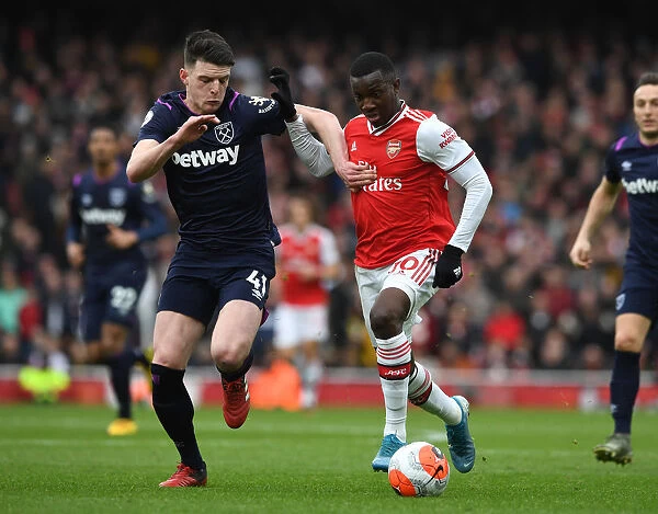 Arsenal's Eddie Nketiah Clashes with West Ham's Declan Rice in Premier League Showdown
