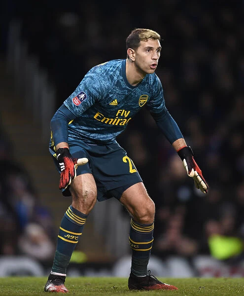 Arsenal's Emi Martinez in Action: FA Cup Battle at Portsmouth