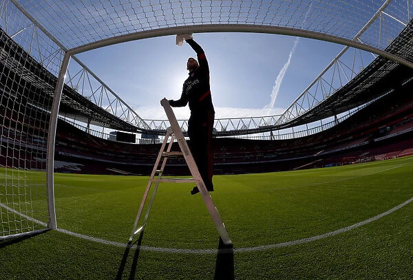 Arsenal's Emirates Stadium: Groundskeeper Prepares for Arsenal vs Crystal Palace Match