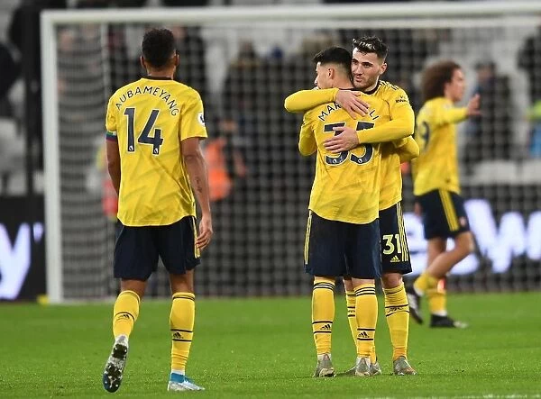 Arsenal's Emotional Victory: Kolasinac Consoles Martinelli After West Ham Clash