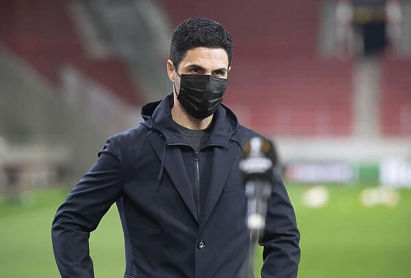Arsenal's Europa League Clash with Olympiacos: Mikel Arteta Holds Pre-Match Conference Amidst Empty Stands in Piraeus