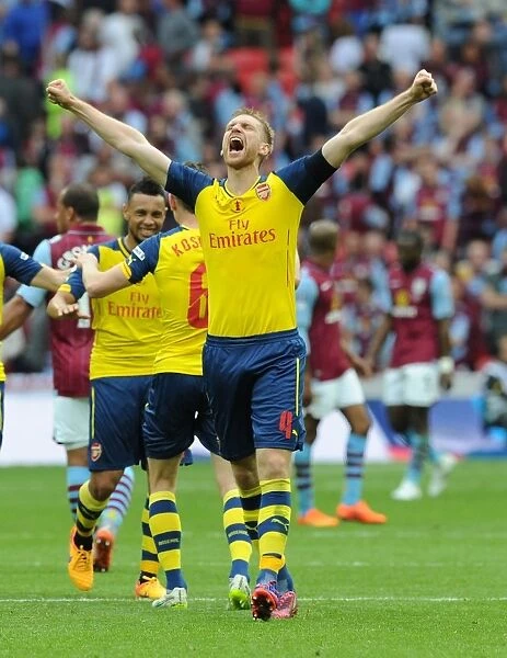 Arsenal's FA Cup Triumph: Mertesacker's Emotional Celebration of Giroud's Goal