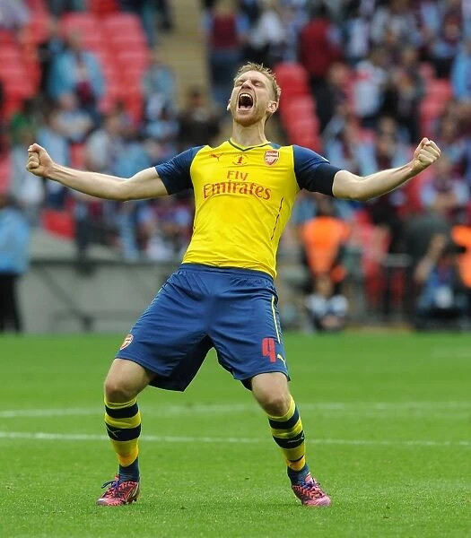 Arsenal's FA Cup Victory: Per Mertesacker's Euphoric Moment after Scoring the Fourth Goal against Aston Villa
