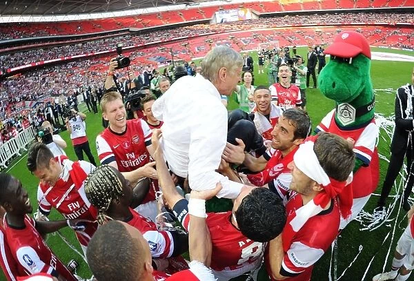 Arsenal's FA Cup Victory: Wenger Lifted on Shoulders by Jubilant Squad