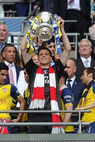 Arsenal's FA Cup Victory: Wojciech Szczesny Lifts the Trophy (2015)