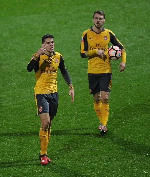 Arsenal's Gabriel and Ramsey in FA Cup Action against Preston North End