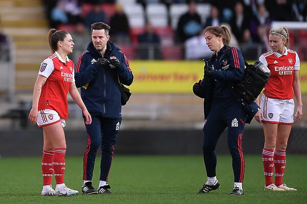 Arsenal's Gio Queiroz Receives Medical Attention During Tottenham vs Arsenal Women's Super League Clash