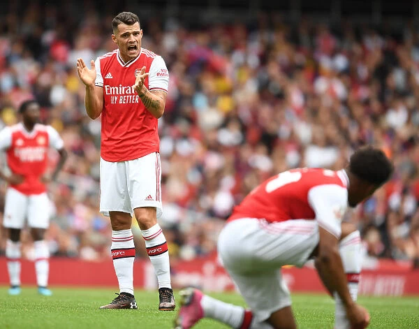 Arsenal's Granit Xhaka in Action against Olympique Lyonnais at Emirates Cup 2019