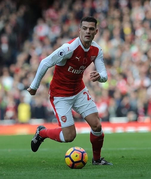 Arsenal's Granit Xhaka in Action Against Tottenham in the 2016-17 Premier League