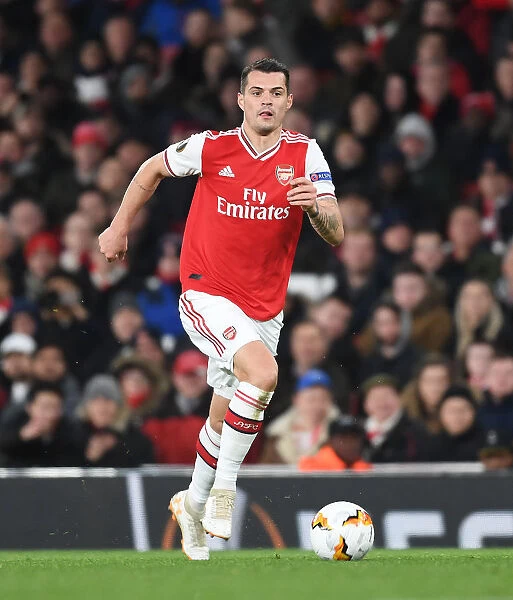 Arsenal's Granit Xhaka in Europa League Clash Against Olympiacos