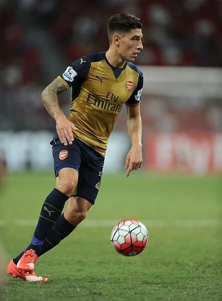 Arsenal's Hector Bellerin in Action against Singapore XI during Barclays Asia Trophy